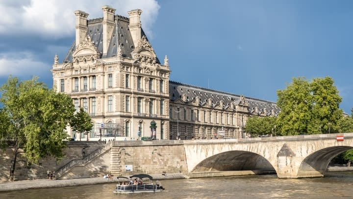 The Louvre Museum seen from the Seine